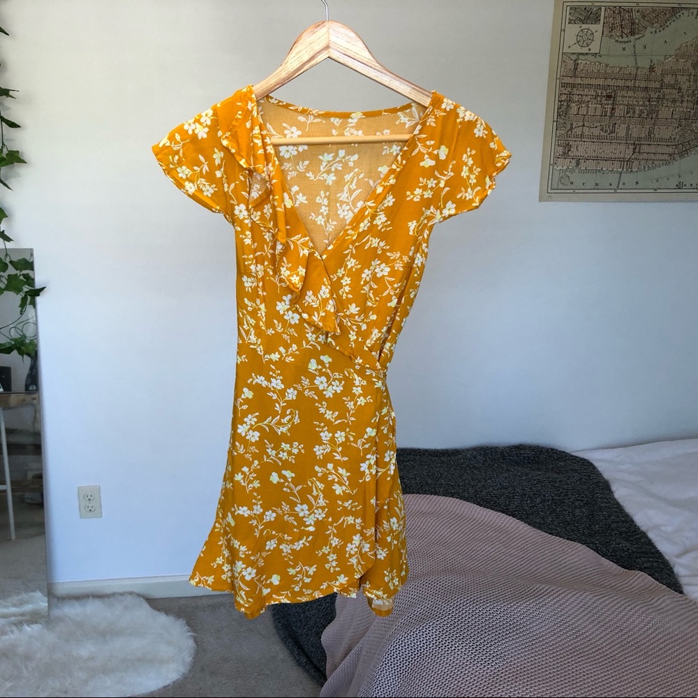 Yellow floral tie ruffle wrap dress